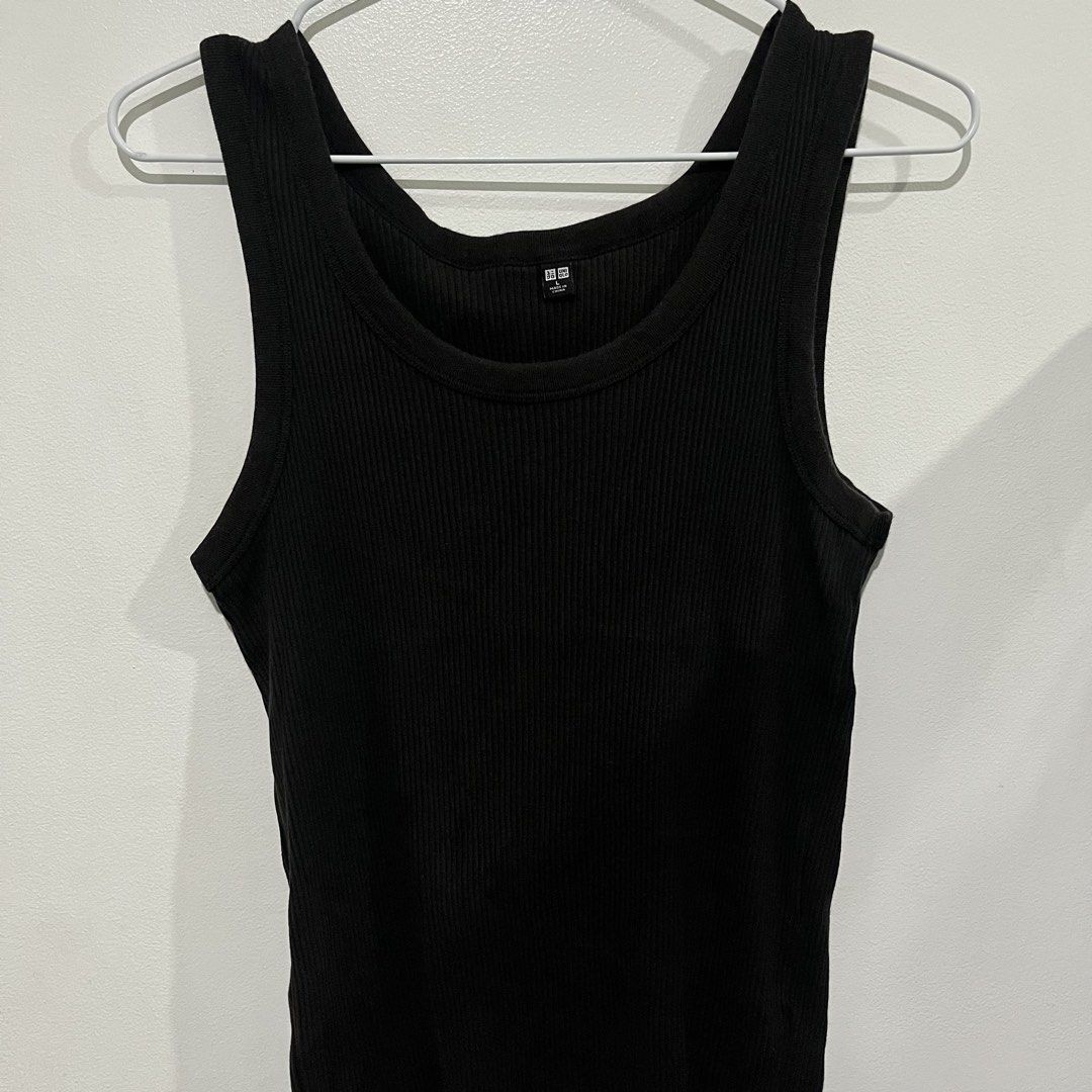 Uniqlo Black Soft Ribbed Top (Category: Sleeveless) located in Quezon City. Submitted by shopnina (Listing ID 1462977948, Image 2). Description: - Uniqlo basic black ribbed tank top - Sleeveless with a scoop neckline - Made from soft and stretchy material - Ideal for layering or wearing on its own - Effortlessly pairs with any bottoms - A must-have wardrobe essential RFS: Decluttering RD2.