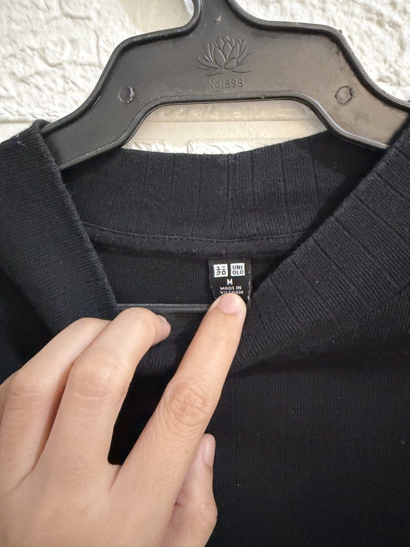 Uniqlo Ribbed Mock Neck Top (Black) (Category: Blouses) located in General Santos City (Dadiangas). Submitted by bvbthrifts (Listing ID 1463060943, Image 3). Description: - Size on tag: Medium - In good condition - Color Rate: 8/10 - No issues RFS: Decluttering.
