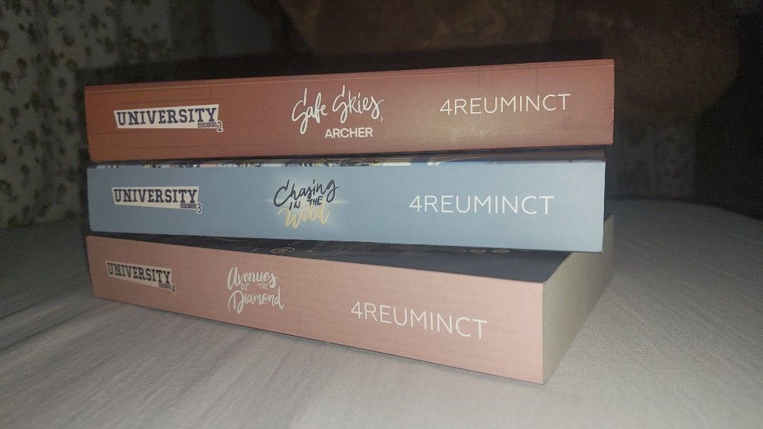 University Series by 4reuminct Premium Collection Bundle (Category: Storybooks) located in Caloocan City. Submitted by mikteeeeaaa (Listing ID 1463048486, Image 2). Description: University Series by 4reuminct Premium Versions - Safe Skies, Archer (w/ TLC Travel Journal Notebook) - Chasing in the Wild - Avenues of the Diamond Inclusions: Assorted official and unofficial merch of the book series Quality: Have only been displayed. Never got to read.