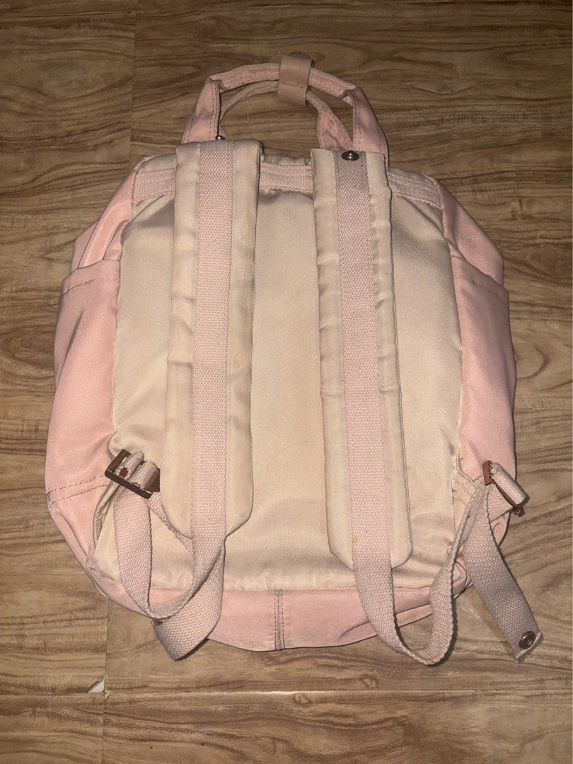 (USED) Doughnut Styled Backpack (Category: Backpacks) located in Cavite. Submitted by moricherrry1 (Listing ID 1462986612, Image 2). Description: USED | Korean Doughnut Styled Pink Backpack | Decluttering | Already washed | Bought it on 🍊 app PS: NOT FLAWLESS, NO TO MASELAN ESP THE ISSUES LISTED! Issues: Pen marks Rust stains sign of usage Big black pen ink stain inside of bag Needs thorough cleaning MOD: Lalamove | J&T MOP: Gcash LOCATION: Imus