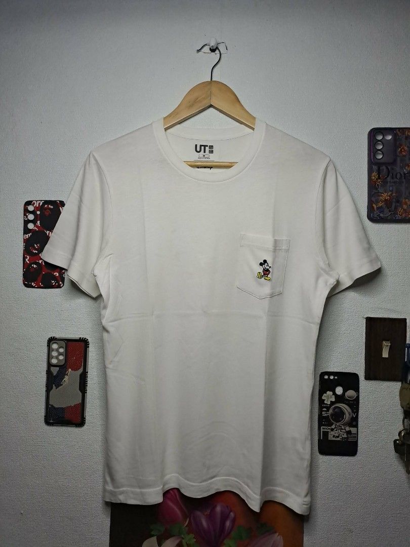 UT Uniqlo Disney Mickey Mouse Pocket Tee (Category: Shirts) located in Manila. Submitted by yaseen__73 (Listing ID 1463049237, Image 1). Description: UT Uniqlo x Mickey Mouse Pocket Tee - Medium - Dimensions : See Photo - Color Rate : 9.9/10 - Needs Re Wash - In Excellent Condition 250.00 Shipped MOP : G C A S H LA LA MOVE SELLER'S LOCATION : 📍Brgy. Pansol, Q.C.