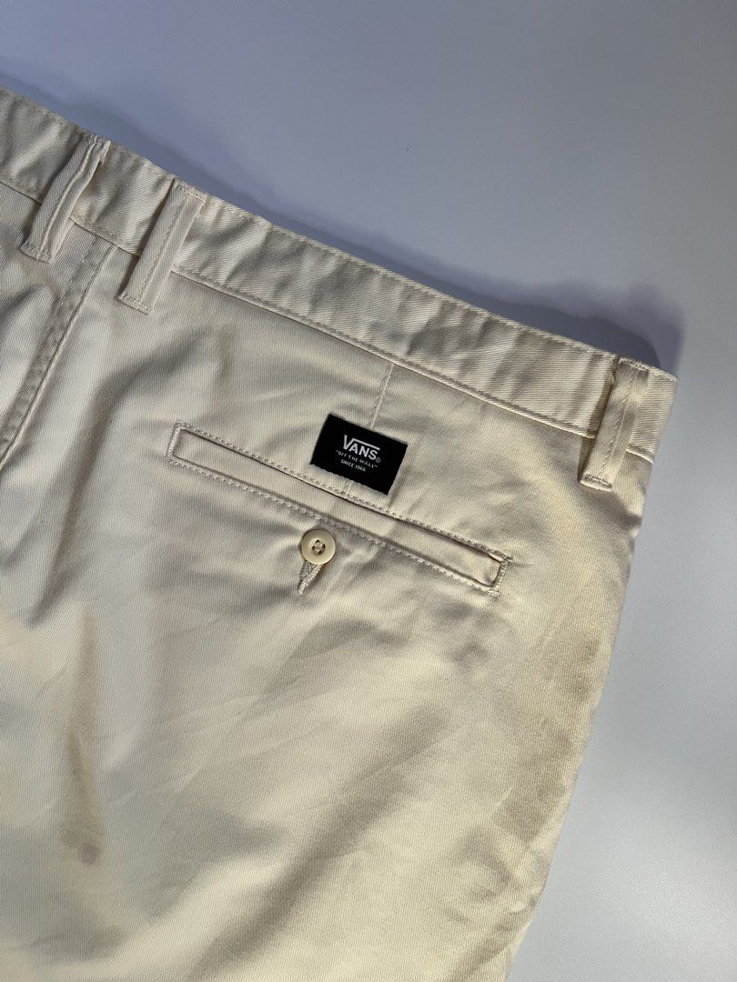 Vans Chino Shorts Size 38 Beige (Category: Shorts) located in Baler. Submitted by allthrifted31 (Listing ID 1462963551, Image 3). Description: - Beige Vans Chino Shorts - Size: 38 - Fit: Classic - Closure: Button and zip - Pockets: Two back pockets with button closure - Detail: Small Vans logo tag on back pocket - Origin: Made in Nicaragua - Ideal for: Everyday wear.