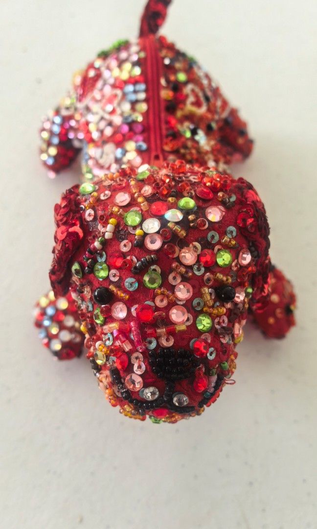 Vintage beaded dog with zipper closure (Category: Wallets & Card holders) located in Tuguegarao City. Submitted by zenphoenix-7ad615 (Listing ID 1462957103, Image 3). Description: Vintage beaded dog in red color.