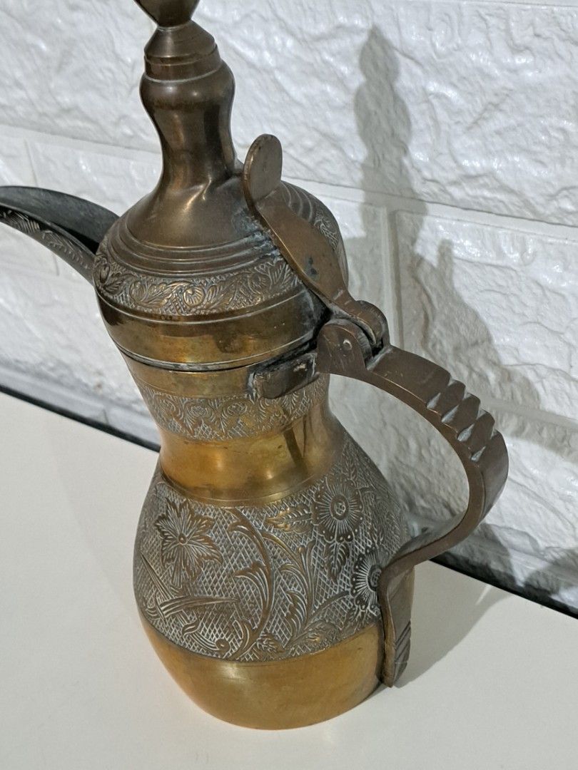 ☕ Vintage Brass Coffee Pot – Etched Design (Category: Other Home Decor) located in Taguig. Submitted by authprelovedonlineshop1 (Listing ID 1462932059, Image 2). Description: ### ☕ Vintage Brass Coffee Pot – Etched Design Beautiful **vintage brass coffee pot** with an elegant, decorative design. ✨ - Intricate **etched/engraved detailing** - Long, curved spout - Curved handle - Hinged lid - Unique vintage shape and design - Approximately **10 inch