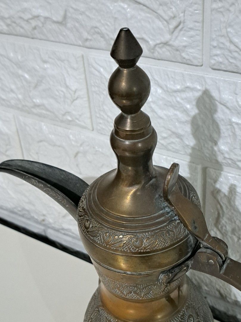 ☕ Vintage Brass Coffee Pot – Etched Design (Category: Other Home Decor) located in Taguig. Submitted by authprelovedonlineshop1 (Listing ID 1462932059, Image 3). Description: ### ☕ Vintage Brass Coffee Pot – Etched Design Beautiful **vintage brass coffee pot** with an elegant, decorative design. ✨ - Intricate **etched/engraved detailing** - Long, curved spout - Curved handle - Hinged lid - Unique vintage shape and design - Approximately **10 inch
