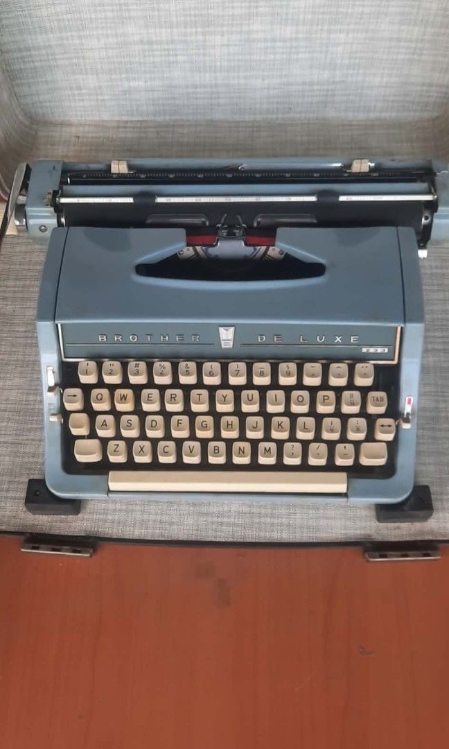 Vintage Brother Deluxe Manual Typewriter (Category: Other Stationery & Craft) located in Manila. Submitted by saferabbit.c78385 (Listing ID 1463051421, Image 1). Description: Vintage Brother Deluxe Manual Typewriter with Original Hard Case ​Price: ₱6,000 ​Condition: Vintage / Pre-loved, excellent cosmetic condition, clean, and well-maintained. All parts are intact, and it comes with its original hard carrying case for safe storage and transport. 