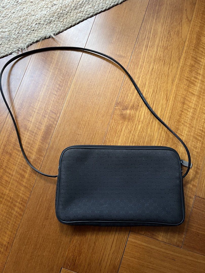 Vintage Gucci bag (Category: Shoulder Bags) located in Rizal. Submitted by jn_mdl (Listing ID 1462972128, Image 2). Description: Title:Authentic Vintage 1980s Gucci Black GG Monogram Bag - ROMAG Hardware Description: Authentic vintage 1980s Old Gucci bag. Crafted from durable black Micro GG monogram canvas with black leather trim and piping. This piece features premium period-correct hardware, including an engraved “GUCCI ITALY” main zipper pull 