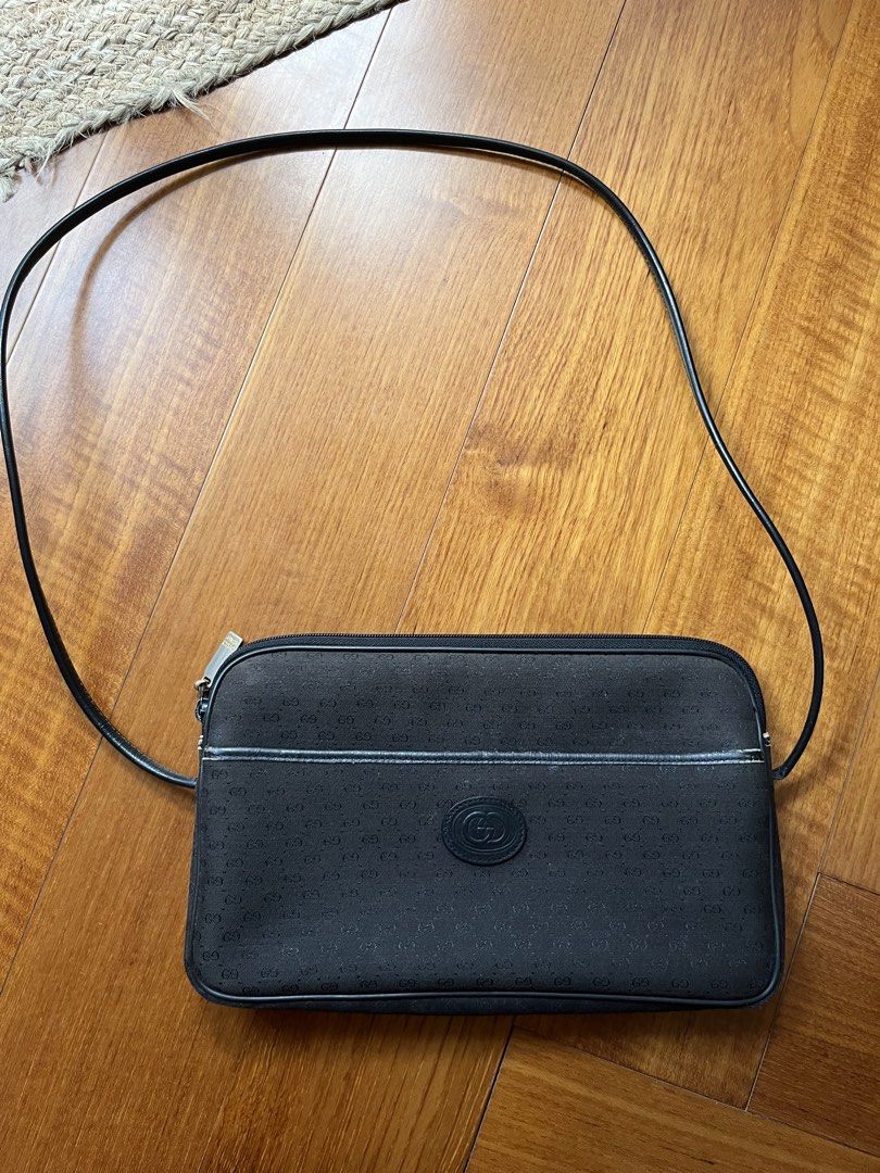 Vintage Gucci bag (Category: Shoulder Bags) located in Rizal. Submitted by jn_mdl (Listing ID 1462972128, Image 1). Description: Title:Authentic Vintage 1980s Gucci Black GG Monogram Bag - ROMAG Hardware Description: Authentic vintage 1980s Old Gucci bag. Crafted from durable black Micro GG monogram canvas with black leather trim and piping. This piece features premium period-correct hardware, including an engraved “GUCCI ITALY” main zipper pull 