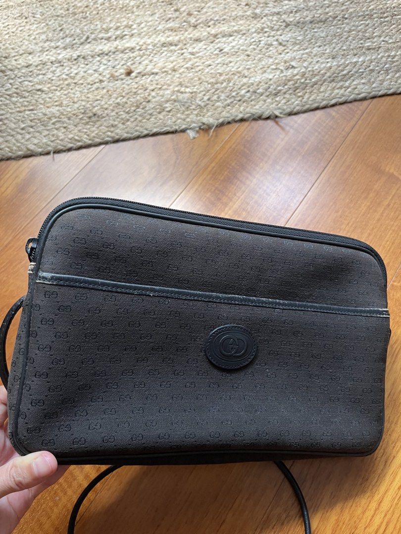 Vintage Gucci bag (Category: Shoulder Bags) located in Rizal. Submitted by jn_mdl (Listing ID 1462972128, Image 3). Description: Title:Authentic Vintage 1980s Gucci Black GG Monogram Bag - ROMAG Hardware Description: Authentic vintage 1980s Old Gucci bag. Crafted from durable black Micro GG monogram canvas with black leather trim and piping. This piece features premium period-correct hardware, including an engraved “GUCCI ITALY” main zipper pull 