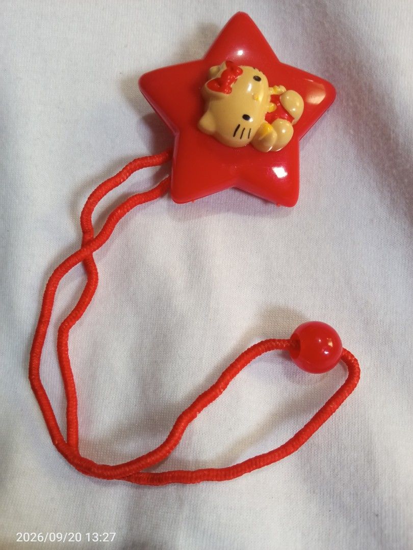 Vintage Hello Kitty Hair tie (Category: Vintage Collectibles) located in Davao. Submitted by banana.pancake (Listing ID 1462934092, Image 2). Description: im afraid to clean the yellow stain, might break it 😅 negotiable.