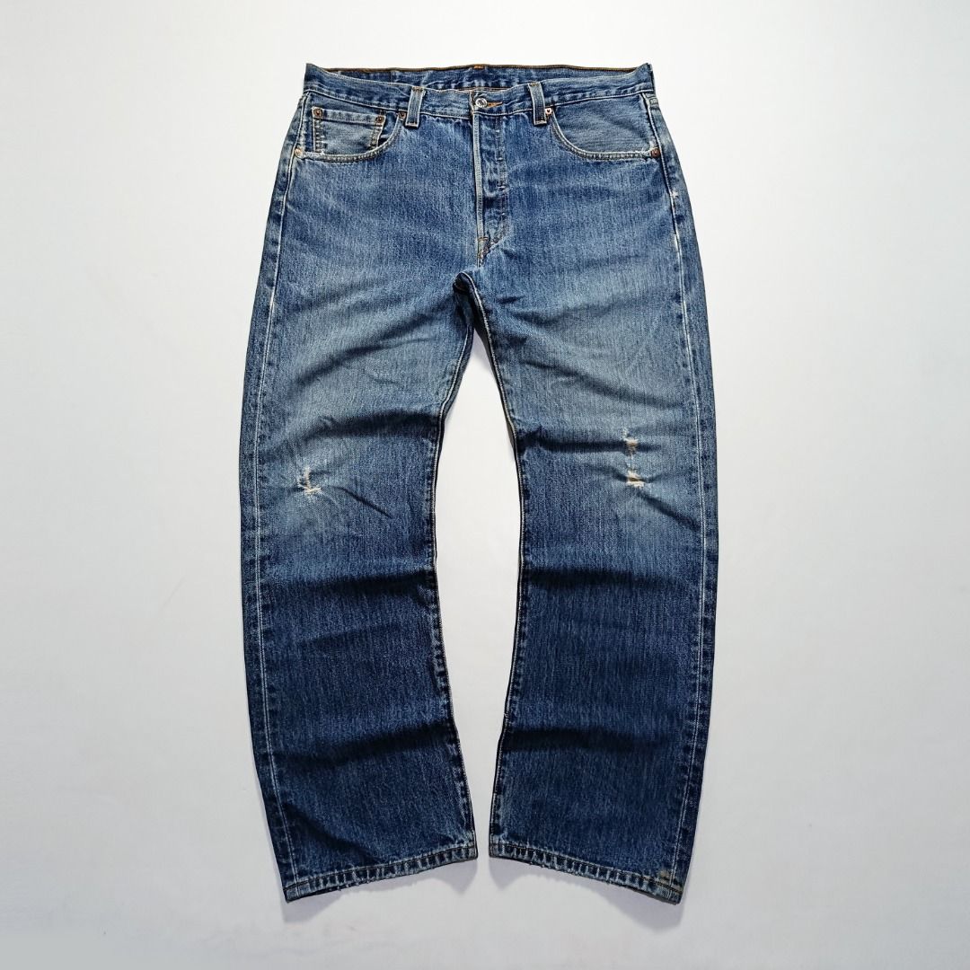 Vintage Levi’s 501 Distressed Knees (Category: Jeans) located in Taytay. Submitted by hoodgrail.vtg (Listing ID 1462944234, Image 1). Description: • Good condition - Lightly used • Classic 501 straight fit with natural knee distressing • Size on tag: W35 L30 — best fits W34 • Measurements: 17.5 x 40 in • Leg opening: 8.5 in • Color rate: 8.5/10 • Issue: Damaged leather patch, knee distressing.