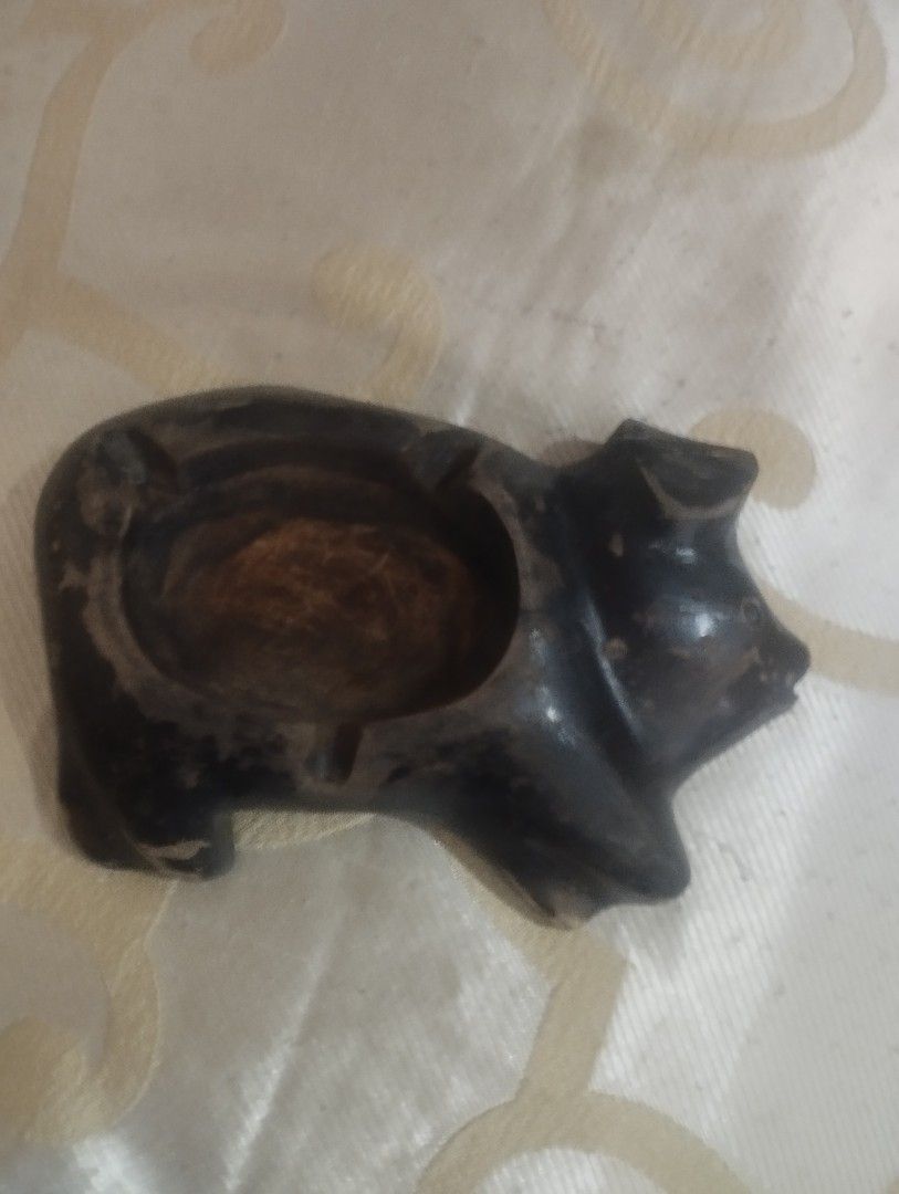 Vintage Pig Ashtray (Category: Other Home Decor) located in Mandaluyong City. Submitted by LEATHERFACE (Listing ID 1462895611, Image 1). Description: - Cute wooden ashtray shaped like a pig - Features a carved-out section for ashes - Ideal for desks or tables - Adds a touch of quirky charm to your space - Measures approximately [insert size here].