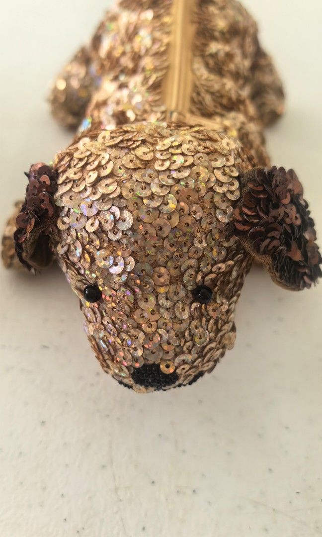 Vintage Sequins Dog in brown color (Category: Wallets & Card holders) located in Tuguegarao City. Submitted by zenphoenix-7ad615 (Listing ID 1462957535, Image 1). Description: Vintage dog With zipper closure.