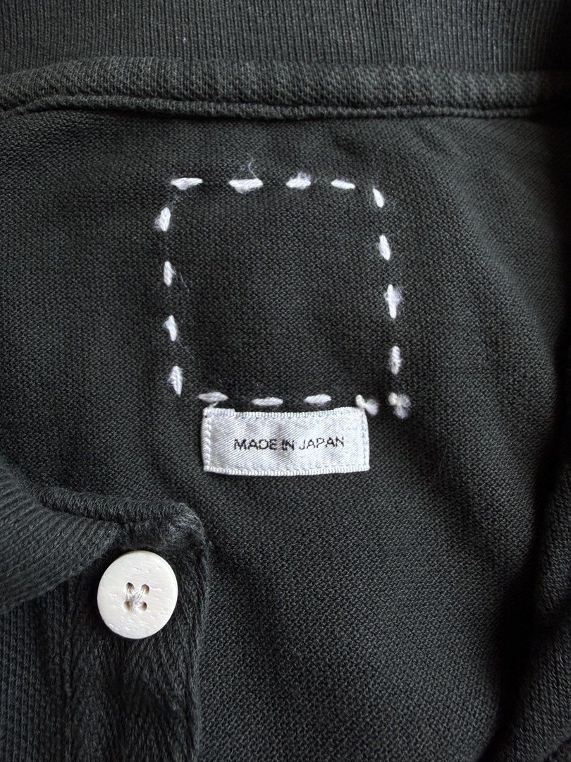 Visvim Jumbo Weller DMGD (Category: Tshirts & Polo Shirts ) located in Manila. Submitted by happy.we.go (Listing ID 1462927303, Image 2). Description: - Brand: CUBISM INC. - Color: Dark Green - Origin: Made in Japan - Material: Cotton - Features: Unique fish patch on chest - Size: Tagged 3 - Care: Please check care label. Color may run or fade with washing. -21.5W x 28L.
