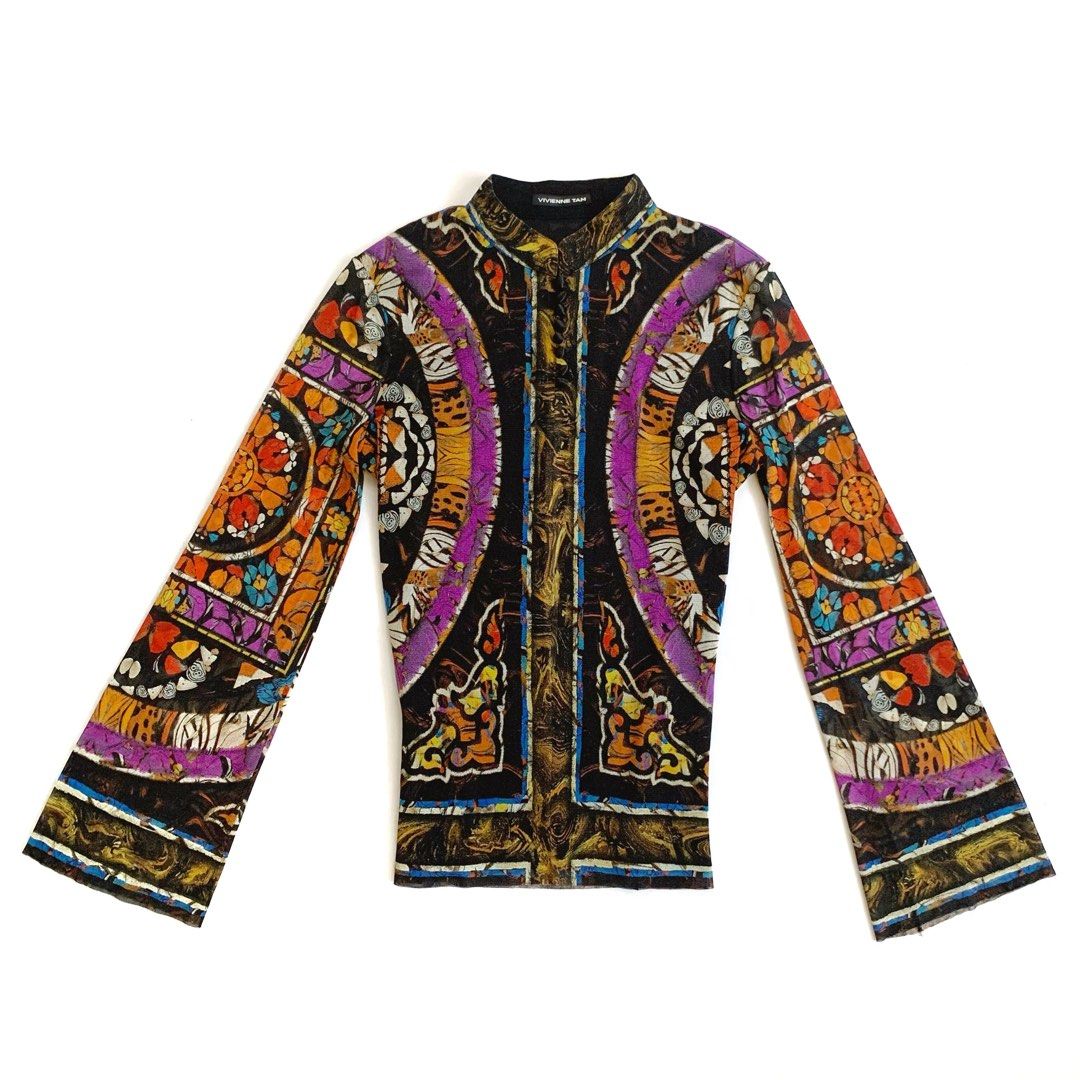 Vivienne Tan Mesh Print Long Sleeve Top (Category: Longsleeves) located in Tarlac. Submitted by luv__vintage (Listing ID 1462902657, Image 2). Description: - Vivienne Tan mesh top - Bold, colorful tiger and floral print - High neckline - Long sleeves - Sheer and lightweight fabric - Ideal for layering or as a standalone statement piece - Fits true to size.