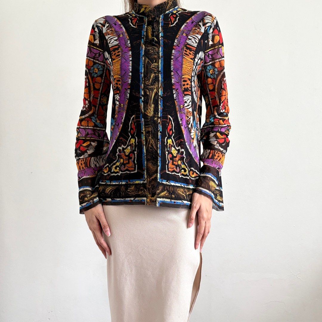 Vivienne Tan Mesh Print Long Sleeve Top (Category: Longsleeves) located in Tarlac. Submitted by luv__vintage (Listing ID 1462902657, Image 1). Description: - Vivienne Tan mesh top - Bold, colorful tiger and floral print - High neckline - Long sleeves - Sheer and lightweight fabric - Ideal for layering or as a standalone statement piece - Fits true to size.
