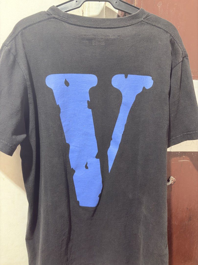Vlone Blue Tee (Category: Activewear) located in Manila. Submitted by laypartosa (Listing ID 1462973021, Image 2). Description: Vlone Big V Logo Tee - Black/Blue with neck tags and wash tags Signs of wear/distress shown in pics RFS: declutter Wearable .