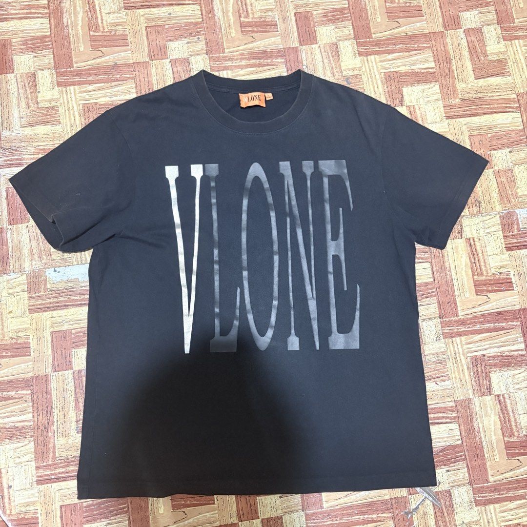 VLONE GRAY SHIRT (Category: Activewear) located in Manila. Submitted by laypartosa (Listing ID 1462972309, Image 2). Description: Selling my VLONE shirts Vlone Big V Logo Tee - Black/Grey with neck tags and wash tags Signs of wear/distress shown in pics RFS: declutter .