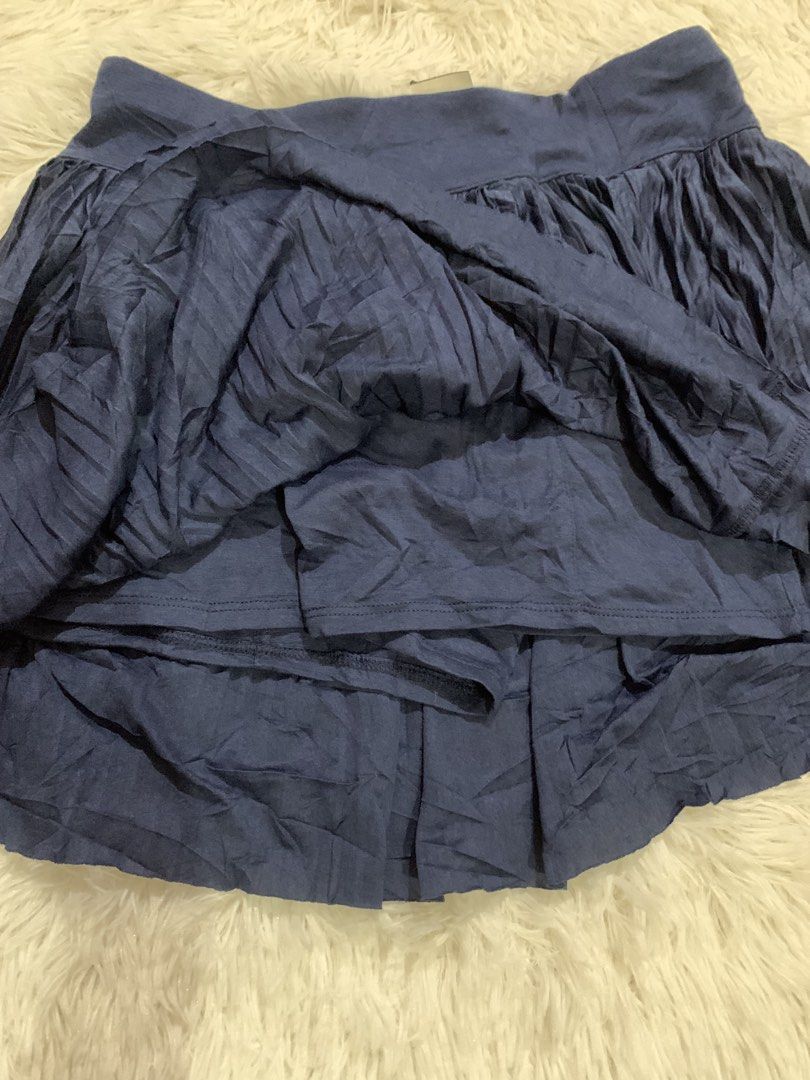 We Wander Navy Blue Pleated Skirt Size L (Category: Skirts) located in Iba. Submitted by thriftcoyan (Listing ID 1462915037, Image 2). Description: - Navy blue pleated skirt by We Wander - Comfortable elastic waistband - Made of polyester fabric - Ideal for casual wear - Easy to pair with various tops -Large on tag 29-31.