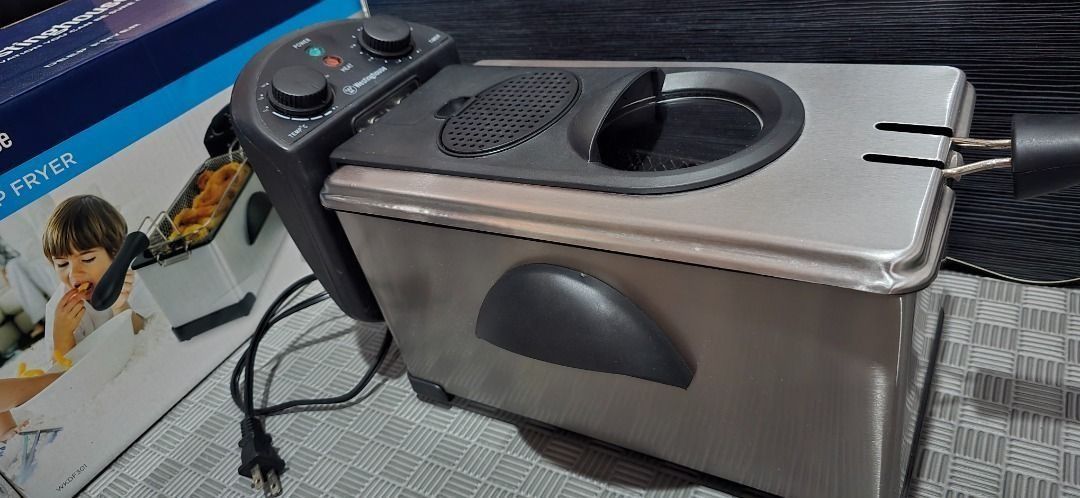 Westinghouse Deep Fryer (Category: Cookware & Accessories) located in Manila. Submitted by ryshl (Listing ID 1463073056, Image 1). Description: ✮ Westinghouse WKDF301 Deep Fryer ⇢ Wattage: 2000W ⇢ Tank/Liter: 3L Enamel Coated Oil Tank ⇢ Other Specifications: Adjustable Temperature Control: 115 °C - 190 °C (239 °F - 374 °F) // 60 Minute Timer // Stainless Steel Housing // Anti-Grease Filter // Indicator Lights ⇢ Complete; with box and manual. Used
