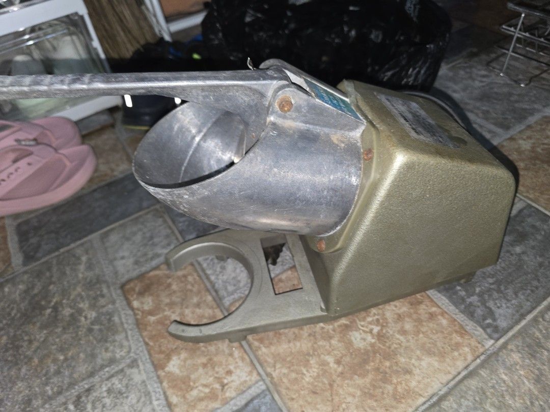 WF-B108 Smash Ice Device Ice Crusher (Category: Other Kitchenware & Tableware) located in Bacoor. Submitted by kennard08 (Listing ID 1463051489, Image 1). Description: - Electric Ice Crusher (Model WF-B108) - Voltage: 220V-240V - Ideal for shaved ice drinks and cocktails - Simple operation: fill with ice and press the handle - Durable metal construction - Note: Shows some signs of wear and rust on metal parts - Tested and confirmed working.