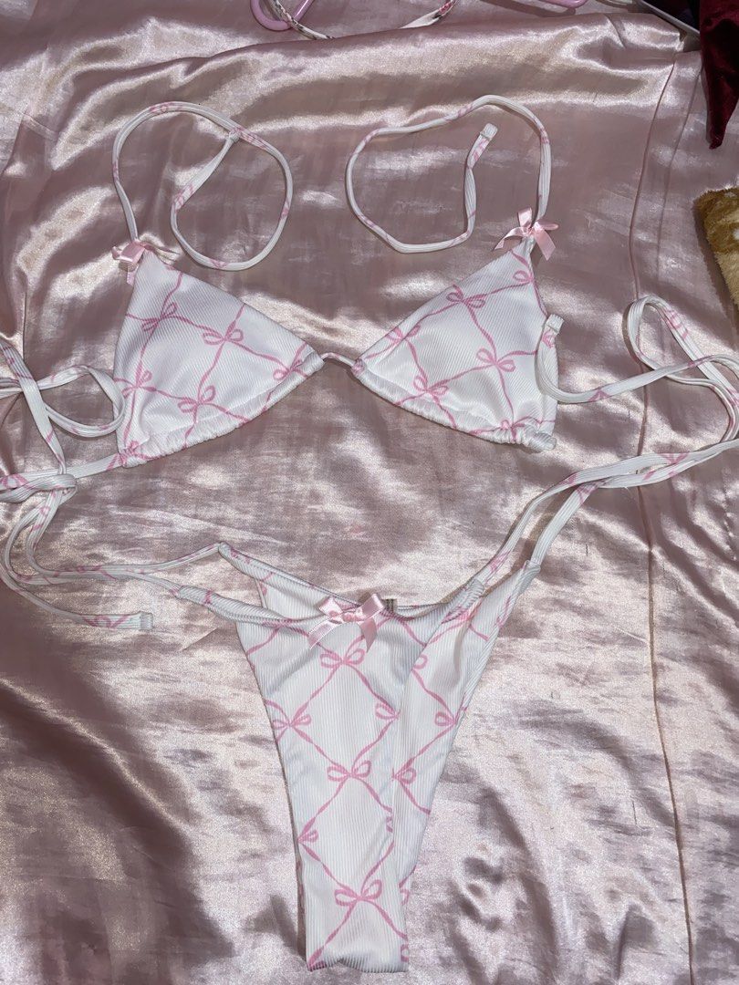 white & pink bikini with bows (Category: Bikinis & Swimsuits) located in San Marcelino. Submitted by zeins.closet (Listing ID 1463019051, Image 1). Description: meet-up/pick-up if around san marcelino/olongapo. additional payment pag shipping.