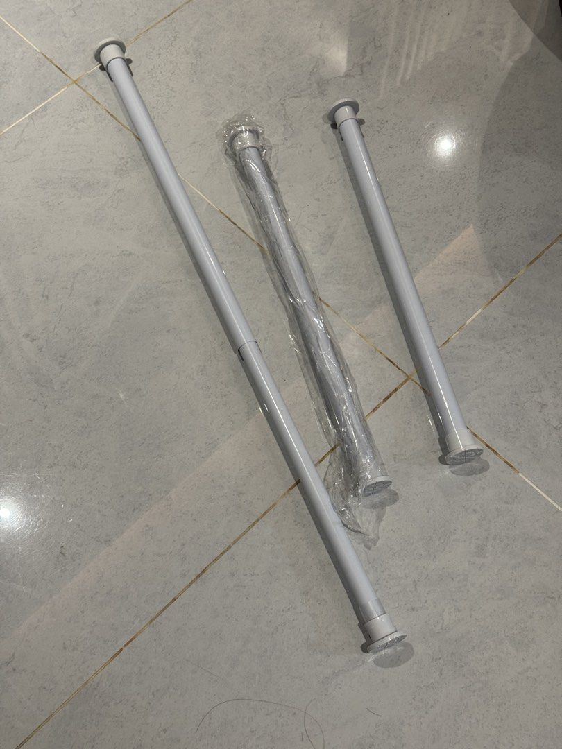 White Adjustable Tension Rods (Category: Bathroom & Kitchen Fixtures) located in Binan City. Submitted by dupie_warren1982 (Listing ID 1463006170, Image 2). Description: - Set of 3 white adjustable tension rods - 1 rod is brand new, still in original packaging - Ideal for hanging curtains, shower curtains, or creating storage solutions - Easy no-tool installation: simply twist to adjust length - 599 for 3 pcs / 199 each.