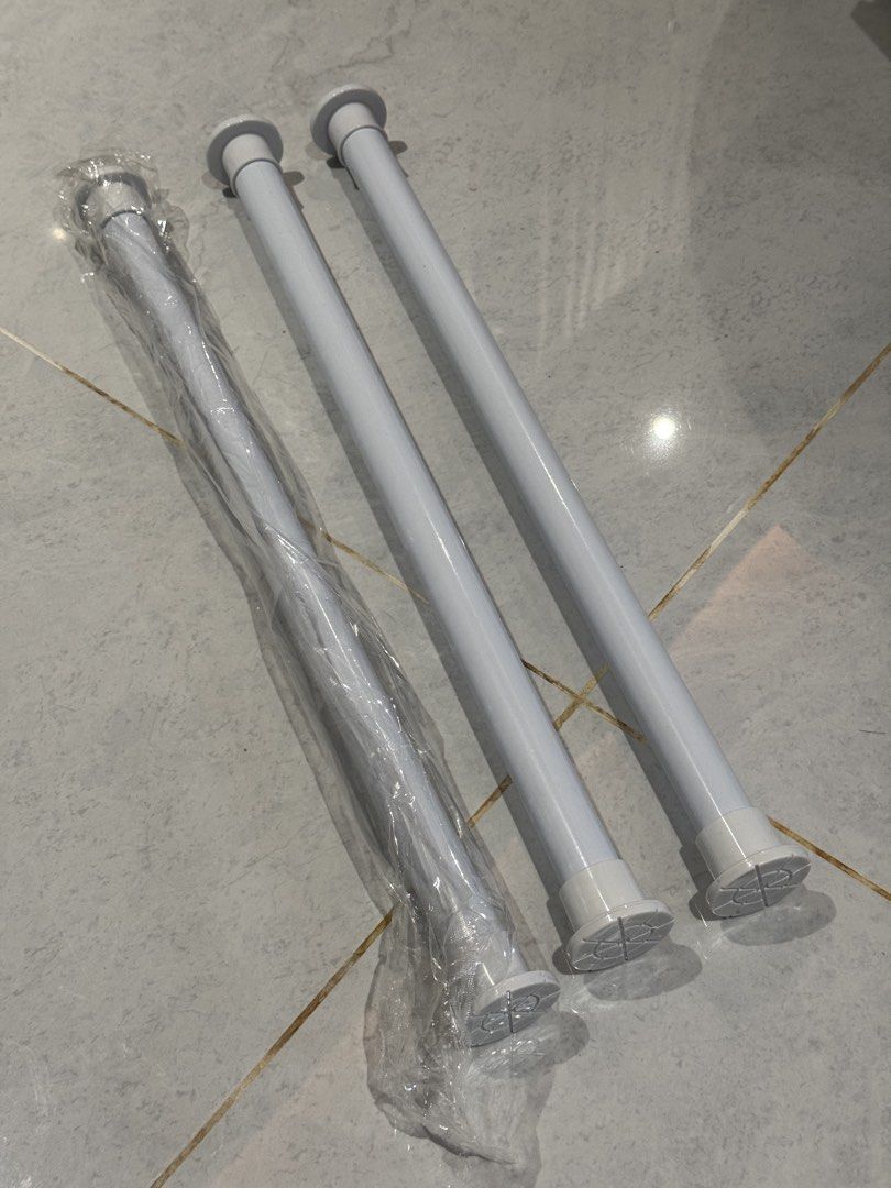 White Adjustable Tension Rods (Category: Bathroom & Kitchen Fixtures) located in Binan City. Submitted by dupie_warren1982 (Listing ID 1463006170, Image 3). Description: - Set of 3 white adjustable tension rods - 1 rod is brand new, still in original packaging - Ideal for hanging curtains, shower curtains, or creating storage solutions - Easy no-tool installation: simply twist to adjust length - 599 for 3 pcs / 199 each.