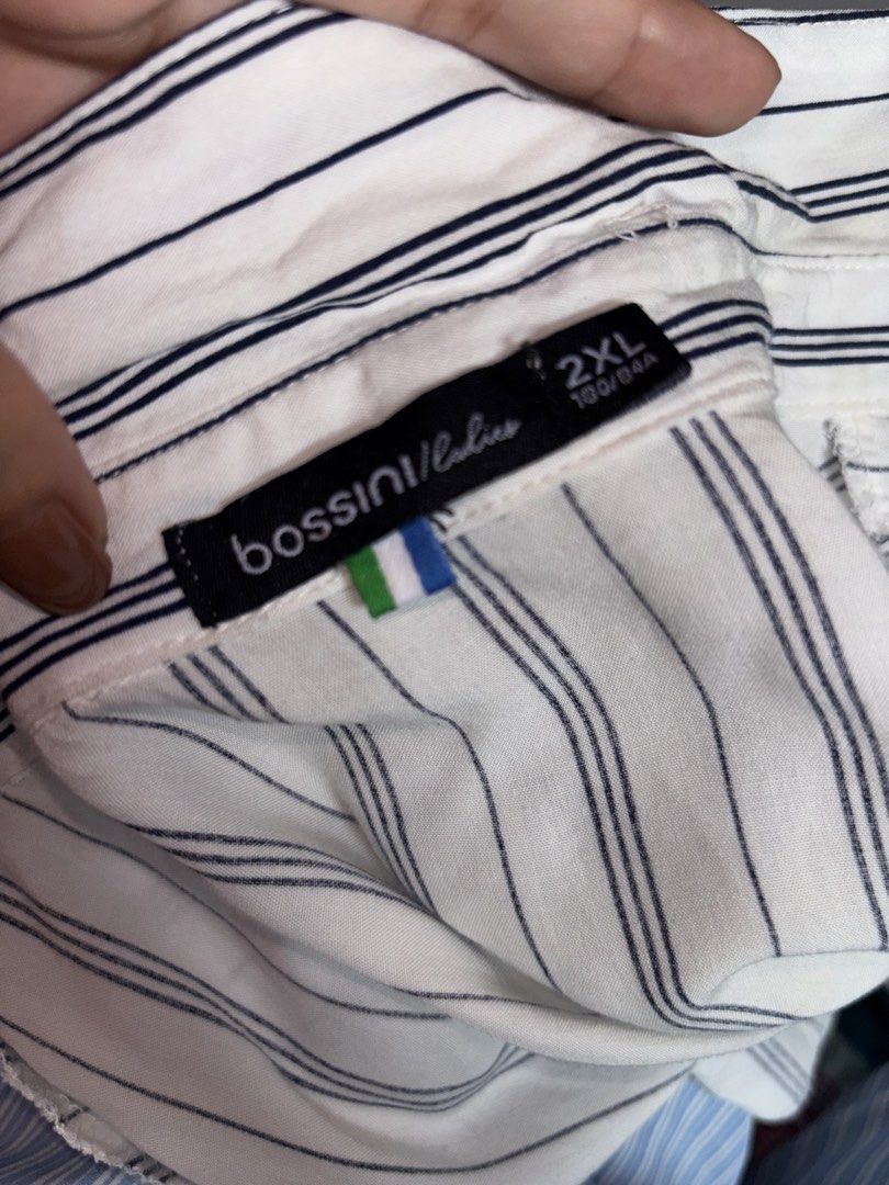 Bossini Striped Button-Up Blouse (Category: Blouses) located in Davao. Submitted by mielle_888 (Listing ID 1463116970, Image 2). Description: - Classic white blouse - Navy pinstripe pattern - Relaxed fit - Malamig ang tela - Versatile for casual or work outfits - All pre-loved items will be washed/sanitized prior to shipping .