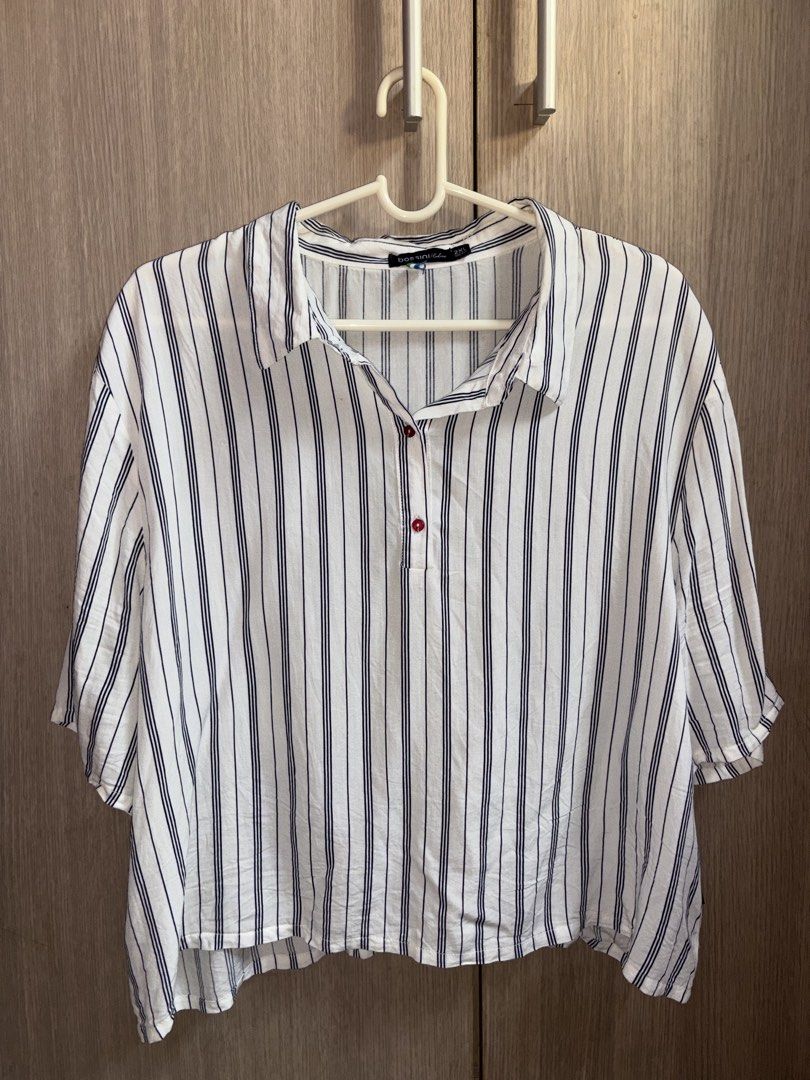Bossini Striped Button-Up Blouse (Category: Blouses) located in Davao. Submitted by mielle_888 (Listing ID 1463116970, Image 1). Description: - Classic white blouse - Navy pinstripe pattern - Relaxed fit - Malamig ang tela - Versatile for casual or work outfits - All pre-loved items will be washed/sanitized prior to shipping .