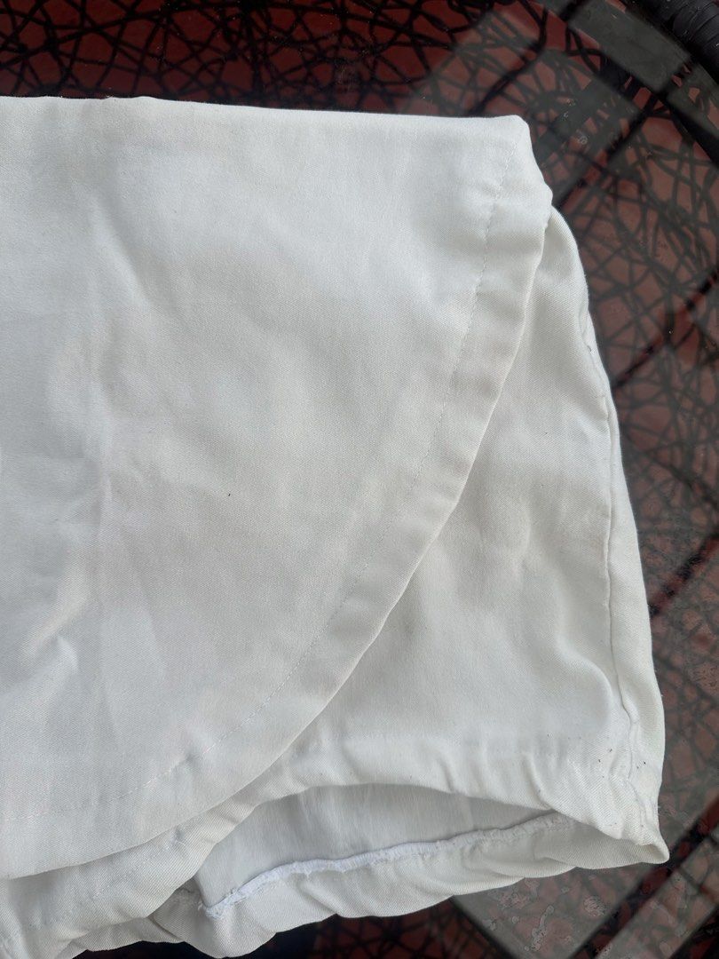 White Elastic Waist Short Skirt (Category: Skirts) located in Manila. Submitted by dandrey.collectives (Listing ID 1463046236, Image 2). Description: - Comfy white short skirt - Ideal for lounging or running errands - Versatile and easy to pair with any top - Classic, simple design.