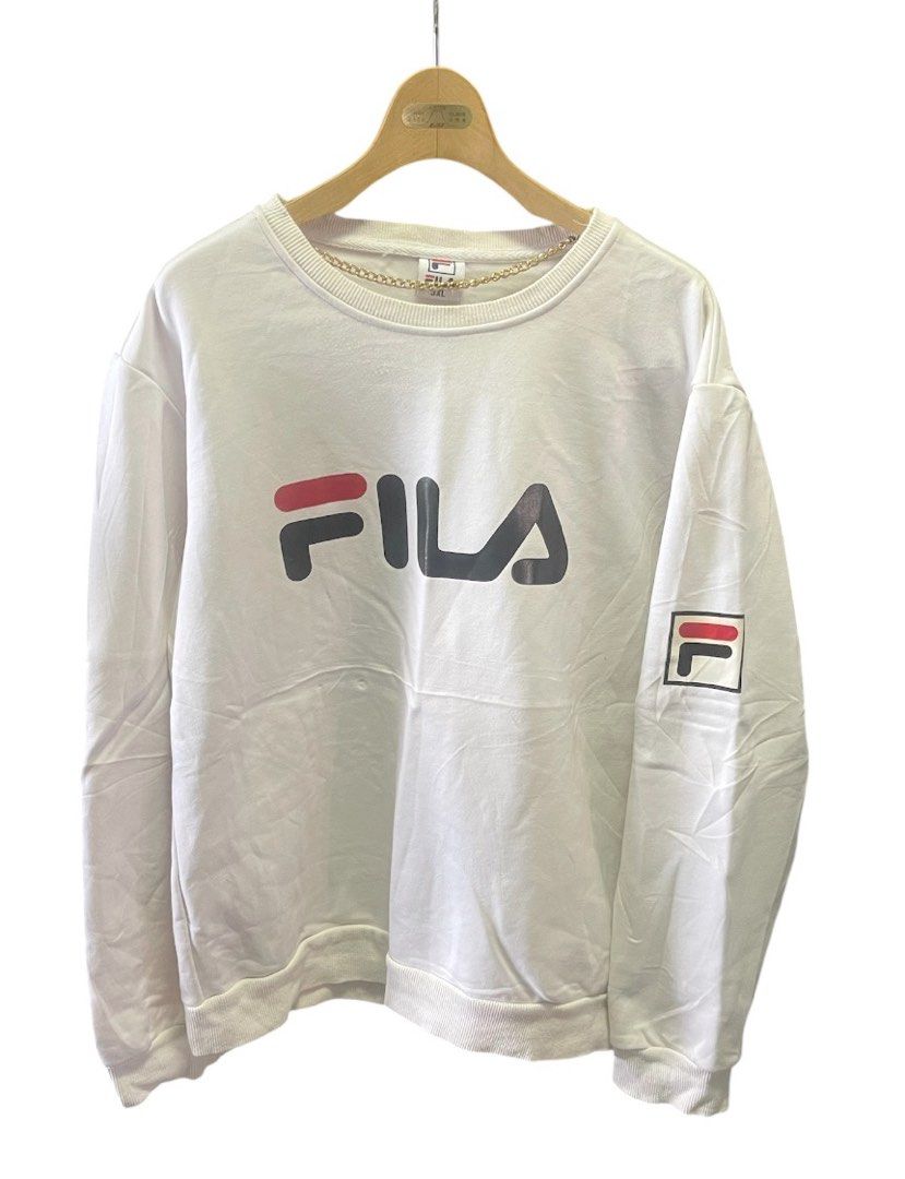 White Fila Sweatshirt Unisex (Category: Coats, Jackets and Outerwear) located in San Pedro. Submitted by lifebeginsaftercoff33 (Listing ID 1463117231, Image 3). Description: - White Fila sweatshirt Unisex - Dimes: 22.5 x 25.5 in (This can be fit upto XL) - Classic Big Fila logo on the front - Smaller Fila logo on the sleeve - Crew neck design - Ribbed cuffs and hem for a comfortable fit - Ideal for everyday casual wear - Very soft comfy thick fab