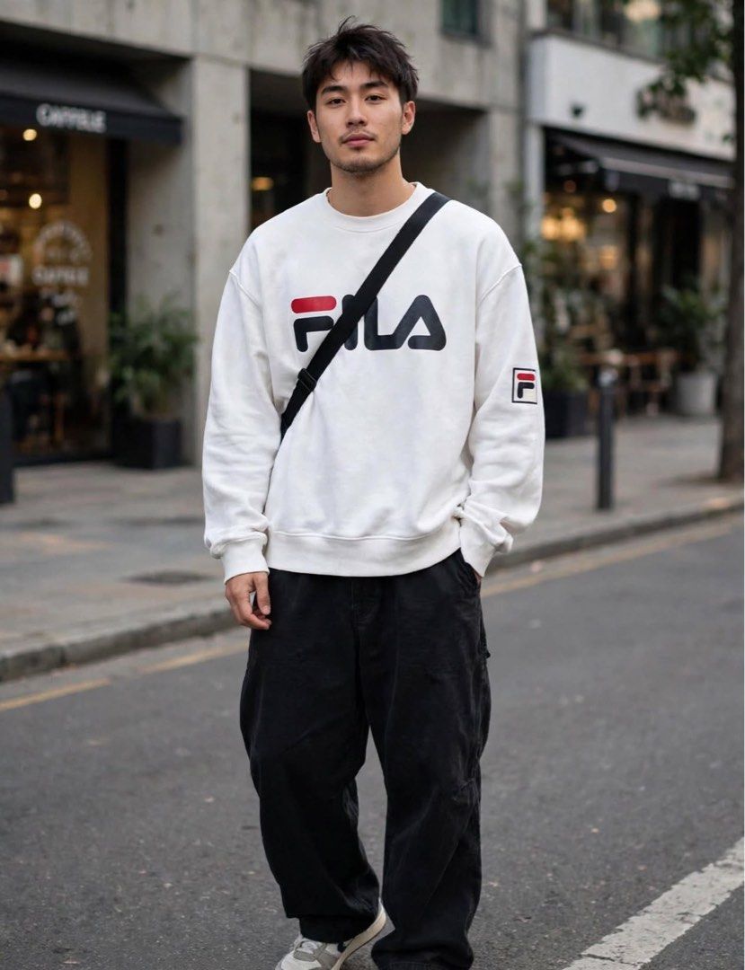 White Fila Sweatshirt Unisex (Category: Coats, Jackets and Outerwear) located in San Pedro. Submitted by lifebeginsaftercoff33 (Listing ID 1463117231, Image 1). Description: - White Fila sweatshirt Unisex - Dimes: 22.5 x 25.5 in (This can be fit upto XL) - Classic Big Fila logo on the front - Smaller Fila logo on the sleeve - Crew neck design - Ribbed cuffs and hem for a comfortable fit - Ideal for everyday casual wear - Very soft comfy thick fab