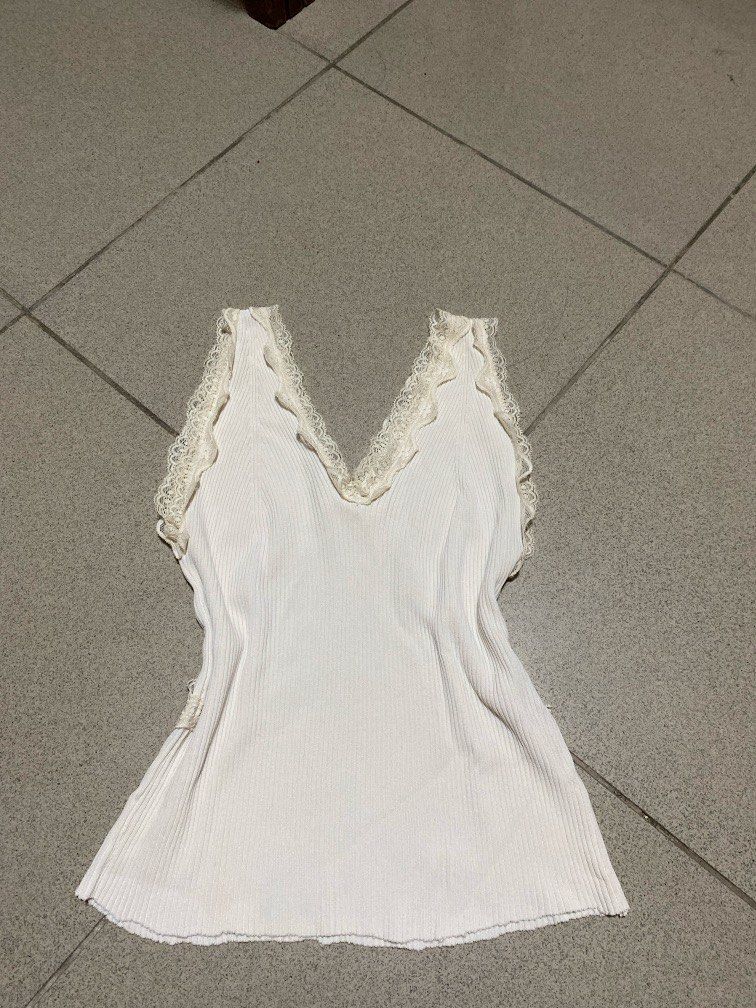 White lace design Top (Category: Sleeveless) located in Dagupan City. Submitted by maryennie (Listing ID 1462955018, Image 3). Description: .