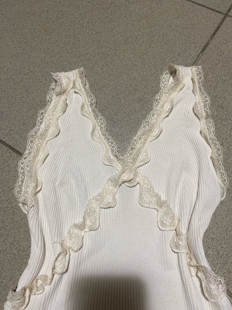 White lace design Top (Category: Sleeveless) located in Dagupan City. Submitted by maryennie (Listing ID 1462955018, Image 2). Description: .