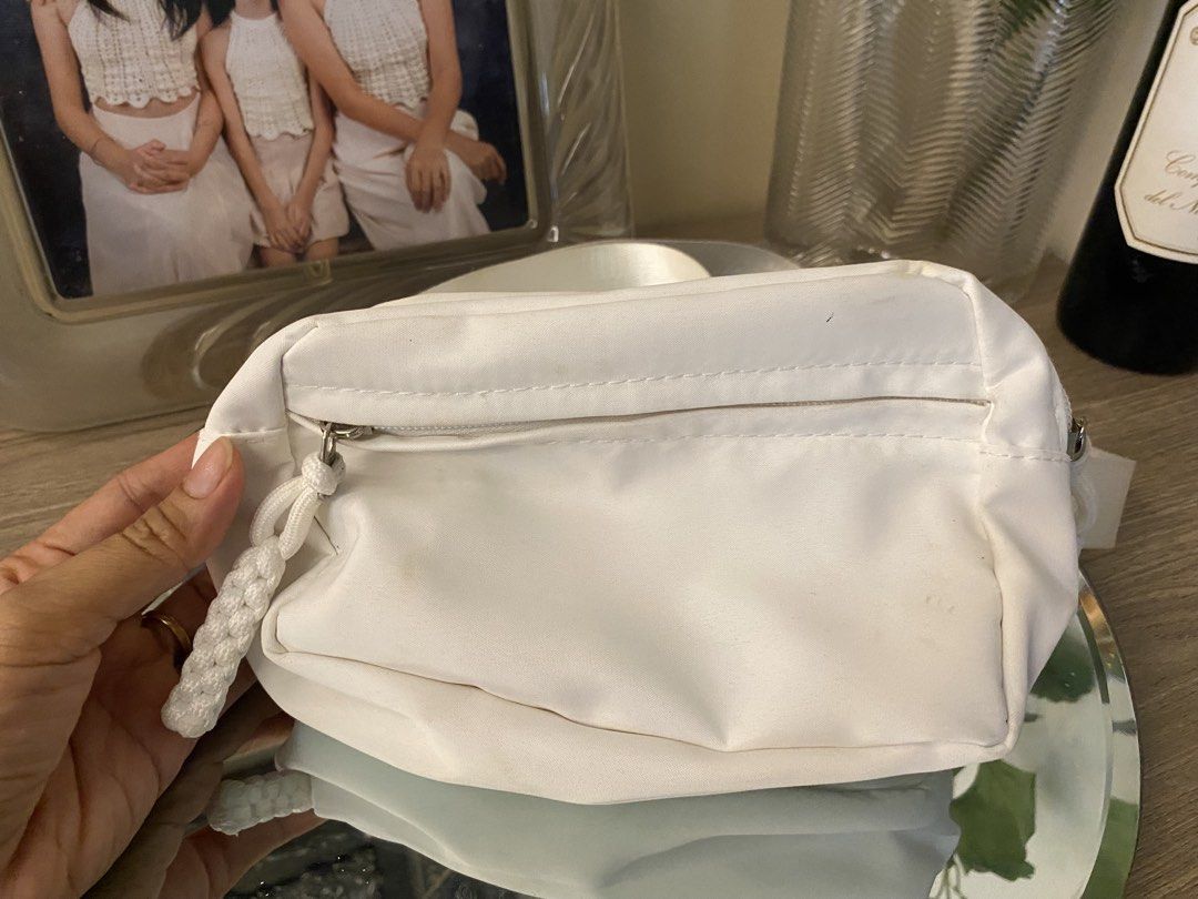 White Nylon Crossbody Bag with Adjustable Strap (Category: Cross-body Bags) located in Santa Rosa. Submitted by hoardqueensdeclutter (Listing ID 1462888643, Image 1). Description: - Stylish white nylon crossbody bag - Zippered main compartment for secure storage - Additional front zip pocket for quick access - Adjustable nylon webbing strap for a custom fit - Perfect for carrying essentials hands-free - Durable and easy-to-clean material.