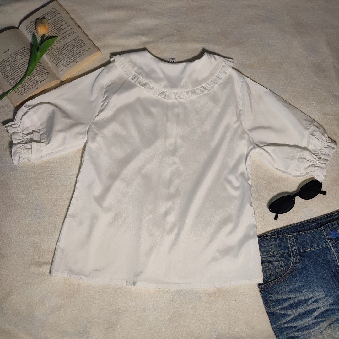 White Peter Pan Collar Blouse with Ruffle Details (Category: Blouses) located in Antipolo. Submitted by _lovedbychie (Listing ID 1462896857, Image 2). Description: 🌸 Size: S-M 🌸 Bust: 34"• Length: 21" 🌸 MOP: Gcash / Maribank 🌸 MOD: J&T / LBC / Lalamove Message me for more info!.
