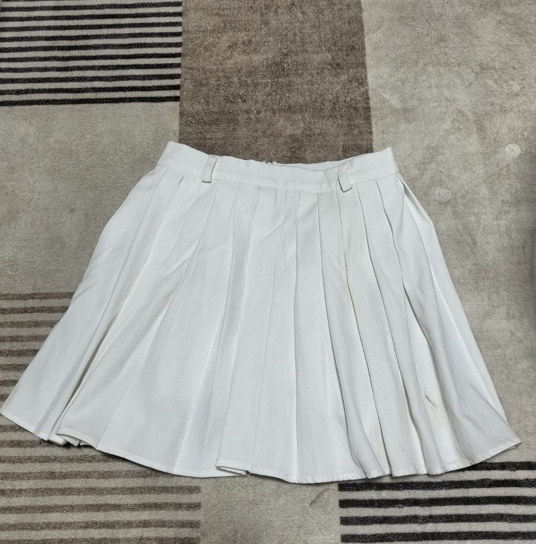 White Pleated Mini Skirt (Category: Skirts) located in Quezon City. Submitted by desespinas (Listing ID 1463004293, Image 1). Description: PERFECT FOR PICKLE BALL OUTFIT - White pleated mini skirt - High-waisted style with belt loops - Estimated size: Medium - Versatile for casual or dressed-up outfits - Easy to pair with various tops.