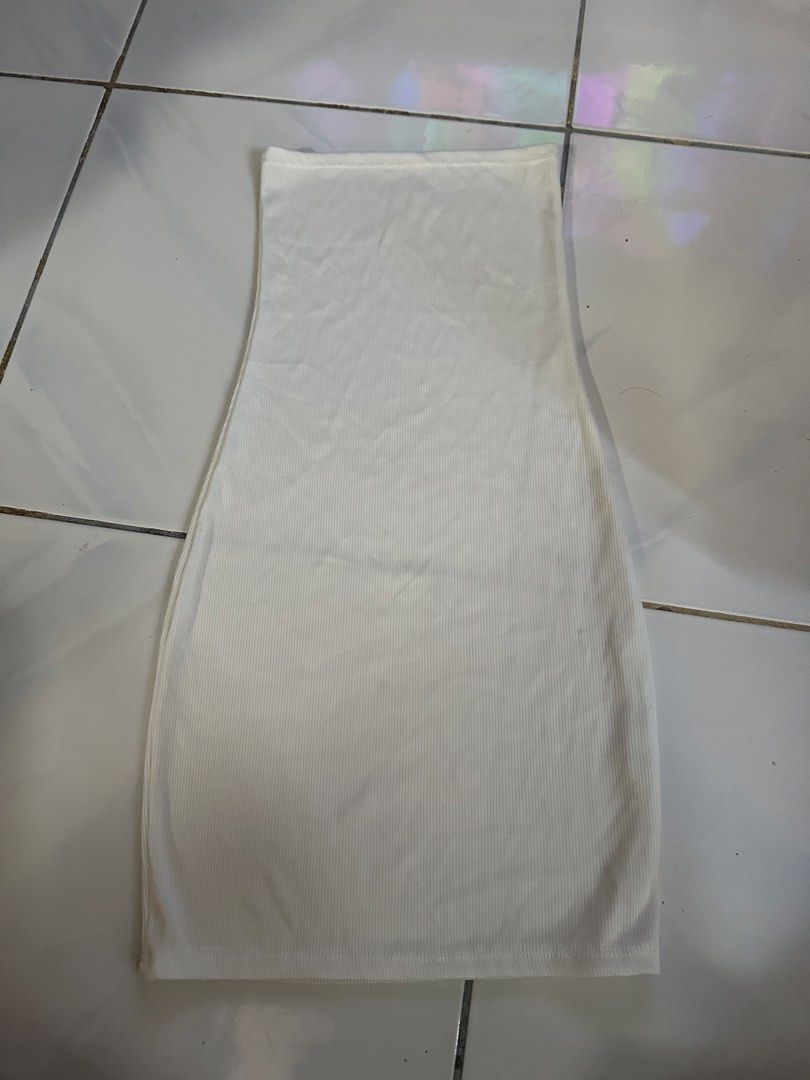 White Ribbed Tube Dress (Category: Dresses) located in Caloocan City. Submitted by triciacab (Listing ID 1462934856, Image 1). Description: - White ribbed tube dress - Stretchy material for a comfortable, bodycon fit - Perfect for dressing up or down - A simple and versatile wardrobe essential - Easy to pair with your favorite accessories.