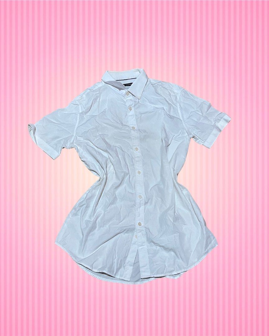 White Short Sleeve Button-Up Shirt (Category: Shirts) located in Bulacan. Submitted by faithcloset (Listing ID 1463035107, Image 1). Description: - Classic white short sleeve button-up shirt - Standard fit - Ideal for casual or smart-casual occasions - Highly versatile, pairs well with anything - Suitable for everyday use.
