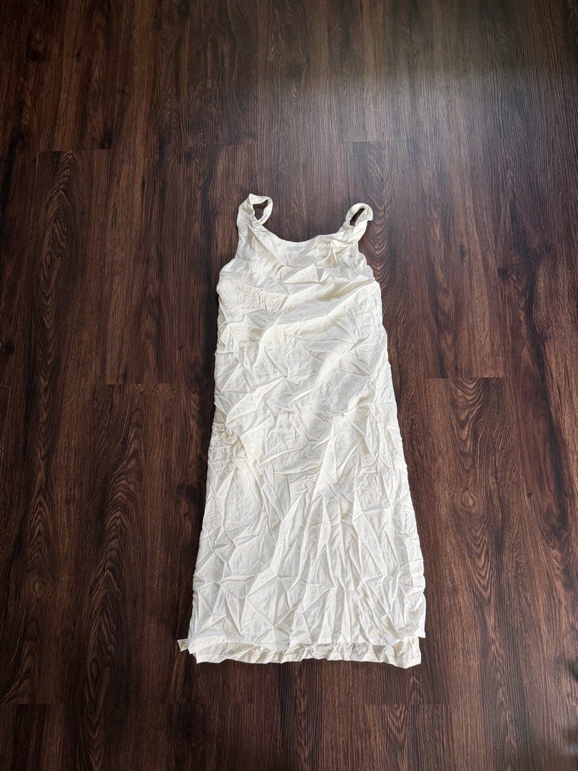 White slip dress (Category: Dresses) located in Pasig City. Submitted by curatedbymaria (Listing ID 1462930716, Image 1). Description: .