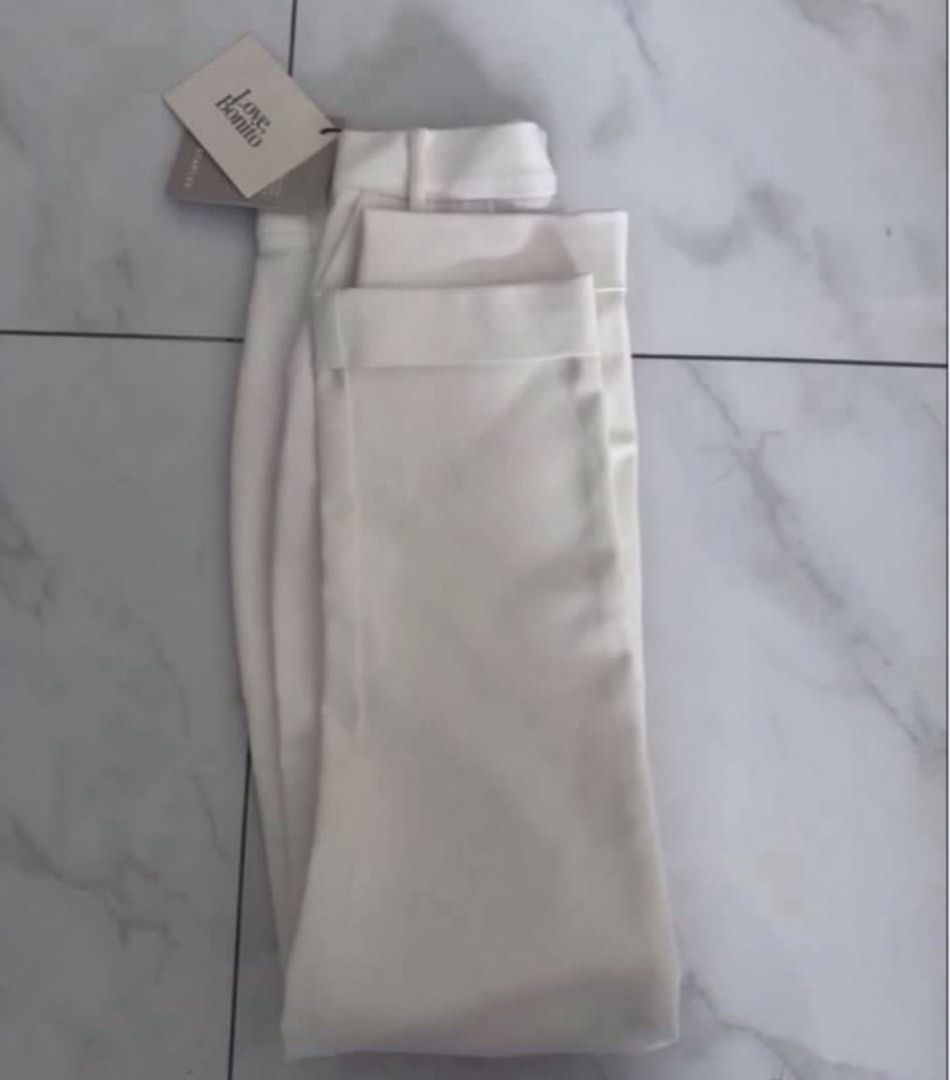 White trouser pants (Category: Other Bottoms) located in Quezon City. Submitted by prelovedsaleitems (Listing ID 1462908402, Image 2). Description: .