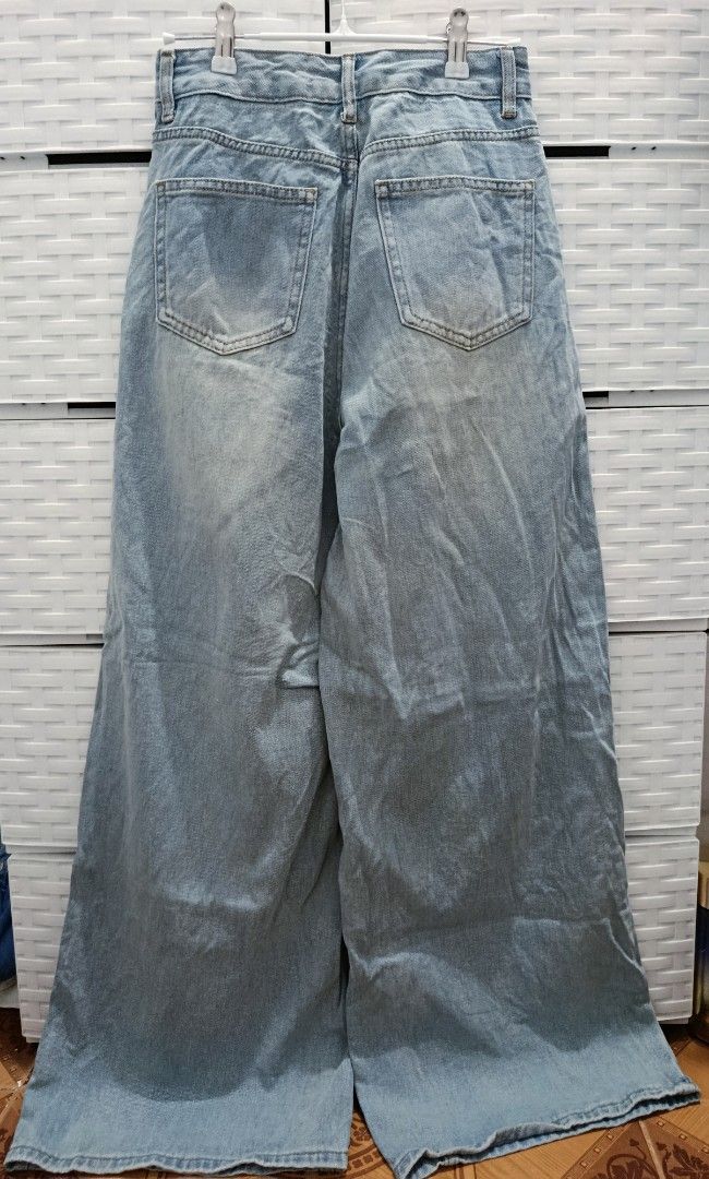 wide leg baggy denim pants (Category: Jeans) located in Quezon City. Submitted by wornthisway_ (Listing ID 1462923326, Image 3). Description: *classic denim wide leg baggy fit, has white minimal stain spots (left leg area). waist: 26 inches length: 41 inches rise: 12.5 inches leg hole: 12.5 inches no when worn. actual photos posted. rfs decluttering.