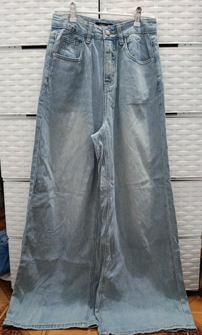 wide leg baggy denim pants (Category: Jeans) located in Quezon City. Submitted by wornthisway_ (Listing ID 1462923326, Image 2). Description: *classic denim wide leg baggy fit, has white minimal stain spots (left leg area). waist: 26 inches length: 41 inches rise: 12.5 inches leg hole: 12.5 inches no when worn. actual photos posted. rfs decluttering.