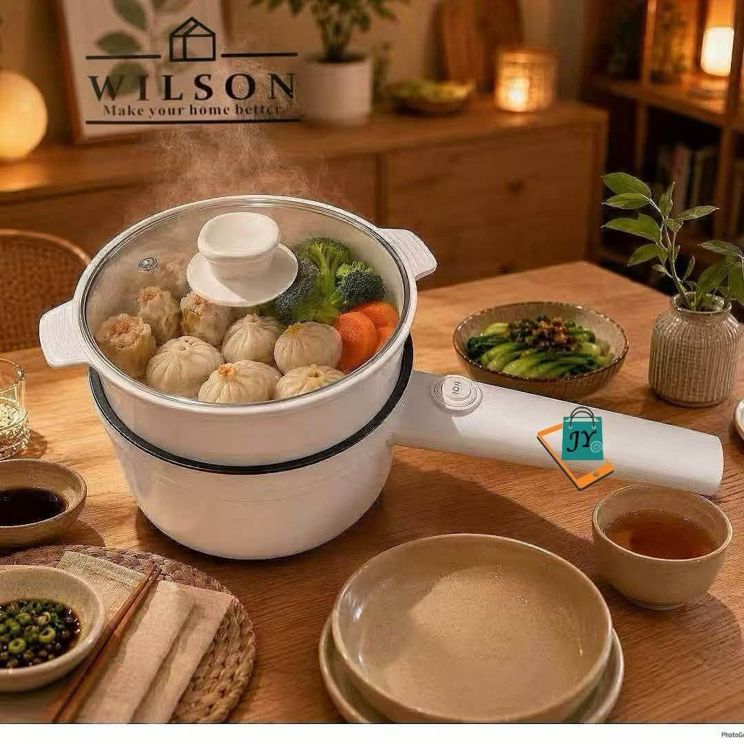 Wilson Electric Pot Steamer Multi Cooker (Category: Cookware & Accessories) located in Manila. Submitted by chaionlineshop (Listing ID 1462993674, Image 2). Description: - Versatile white electric pot with steamer - Perfect for cooking rice, steaming dumplings, and boiling eggs - Comes with a clear glass lid - Compact design, ideal for small kitchens or dorm rooms - User-friendly operation and simple cleaning - Enhance your home cooking experienc