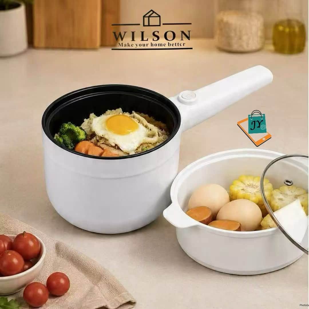 Wilson Electric Pot Steamer Multi Cooker (Category: Cookware & Accessories) located in Manila. Submitted by chaionlineshop (Listing ID 1462993674, Image 1). Description: - Versatile white electric pot with steamer - Perfect for cooking rice, steaming dumplings, and boiling eggs - Comes with a clear glass lid - Compact design, ideal for small kitchens or dorm rooms - User-friendly operation and simple cleaning - Enhance your home cooking experienc