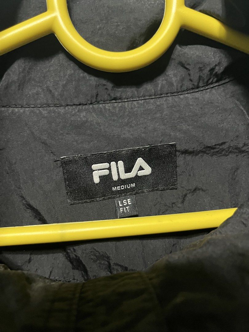 Windbreaker FILA jacket (Category: Coats, Jackets and Outerwear) located in Manila. Submitted by kenneth_cortes3 (Listing ID 1463048763, Image 2). Description: Dimes: Length-25.5 Shoulders-24 Waist-27 Small issues, cigarette burn on neck area and slightly scratched zipper area but still good as new!.