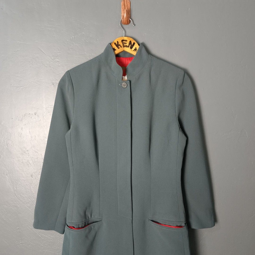 Women's - Kenzo (Category: Coats, Jackets and Outerwear) located in Bacolod City. Submitted by drop.ph (Listing ID 1463031379, Image 1). Description: Kenzo Jungle - Trench Coat Authentic *Vintage, Monogram inside *Size S - 17x31.5 *Excellent cloth *loose button, small scratch, dirt *Price: 1,000php *Add SF if outside Bacolod City .