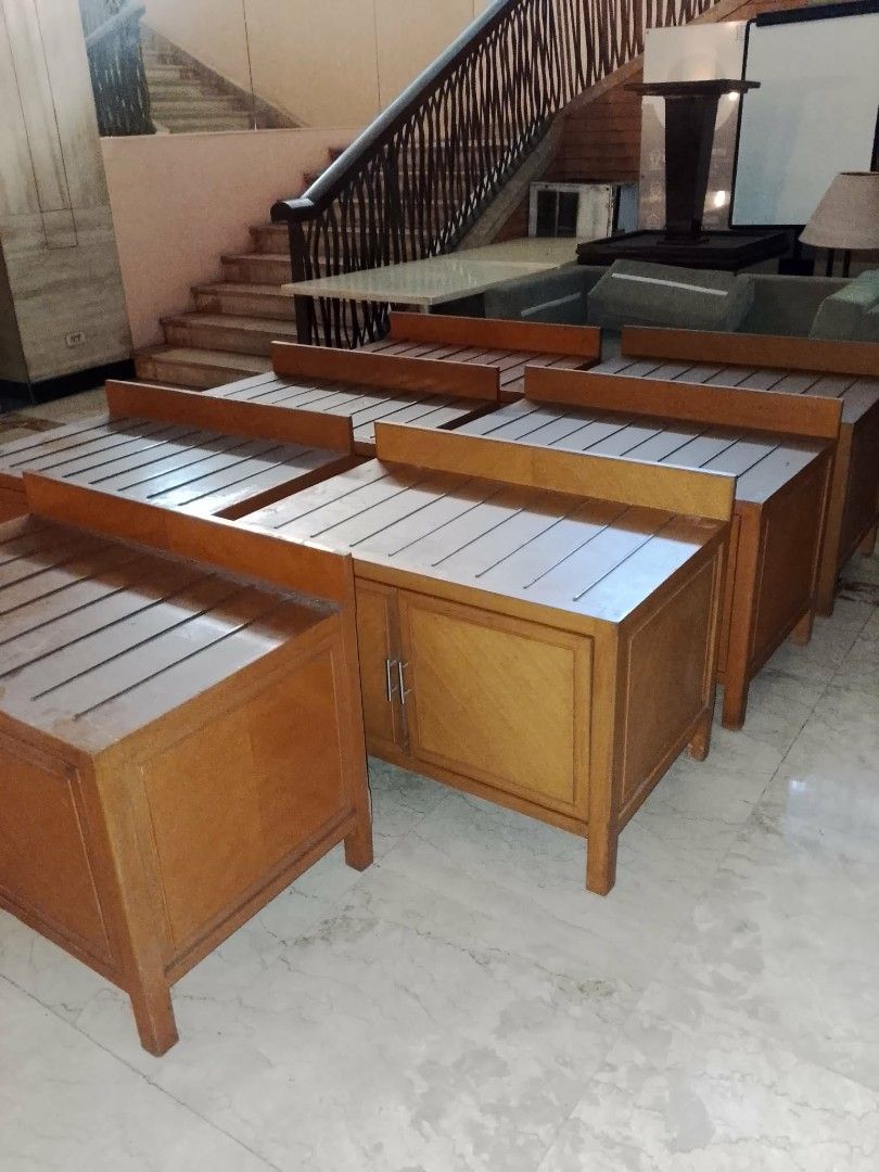 Wooden Storage Cabinet with Doors (Category: Shelves, Cabinets & Racks) located in Las Pinas. Submitted by jesus1smysavi0r (Listing ID 1463109197, Image 1). Description: P2,444 1 piece take all 7 for P2,222 EACH, Whole sale price - Set of sturdy wooden storage cabinets - Features a slatted top surface - Cabinet with two doors for storage - Warm, natural wood finish - Ideal for organizing items - Multiple units available.