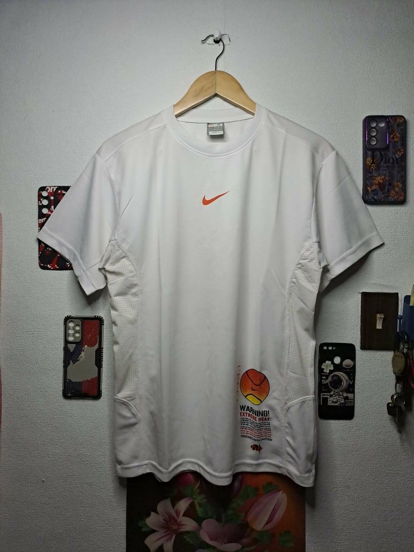 Y2K Nike Swoosh Fit Dry (Category: Tshirts & Polo Shirts ) located in Manila. Submitted by yaseen__73 (Listing ID 1462919674, Image 1). Description: 2000's Nike FiT Dry WARNING ! EXTREME HEAT 08 BALL Breathable Mesh White - Medium on Tag - Dimensions : Please Refer to the Photo - Nearly New Condition - Flawless - PRE OWNED or Best Offer Courier : J&T Express Lalamove MOP : G C A S H B A N K T R A N S F E R Seller's Location: 📍Brgy. Pansol, Q.C.